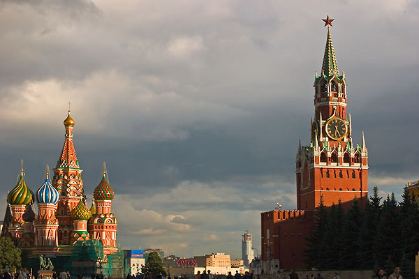Saint Basil's Cathedral and Spasskaya Tower of Moscow Kremlin at Red Square.. Click the image to continue.